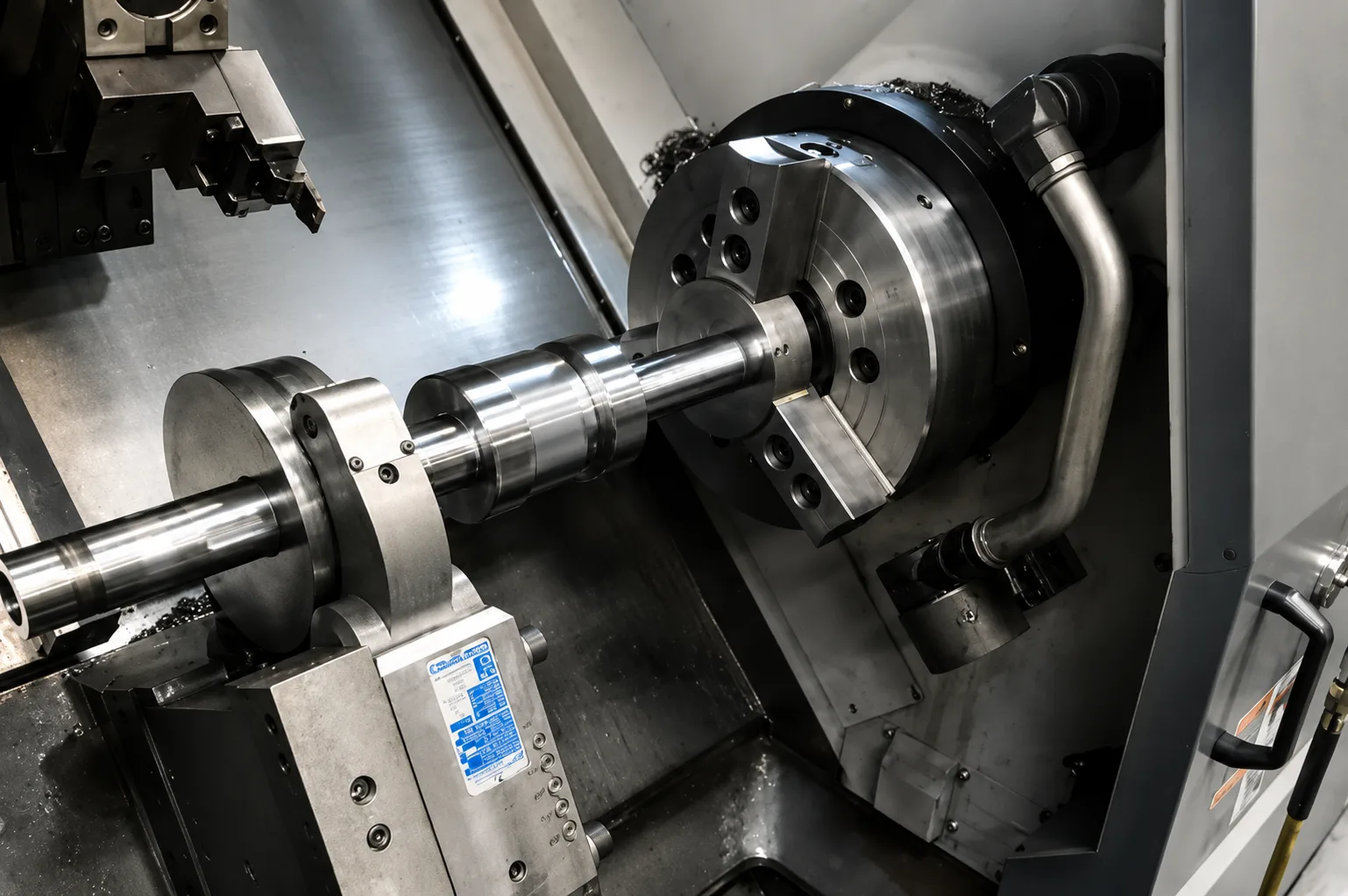 Precision shaft held in a grinding or finishing machine chuck